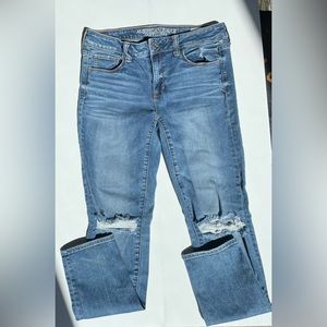American Eagle Size 10 Reg Skinny Jeans - distressed/ripped Mid Rise